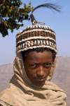 wearing a hat made of goat's hair, mountains near Lalibela