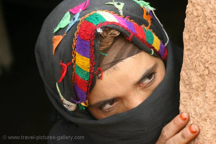 Pictures of Morocco -  traditional girl with a veil