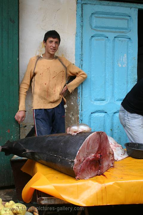 selling tuna in a coastal village