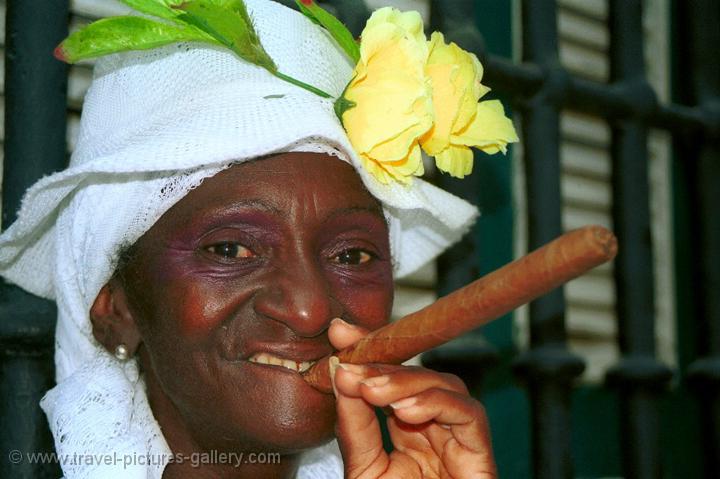 woman in traditional clothing with a cigar, Havana