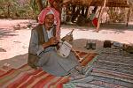 Bedouin man playing a violin like instrument, Sinai Desert