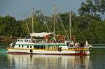 a boat specially rigged for Gambia River tours