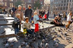 feeding the pigeons at Dam Square