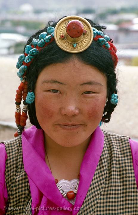 Tibetan girl with traditional jewels, Lhasa, Tibet