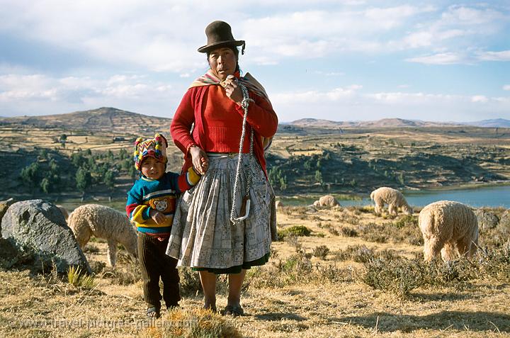 Aymara woman and grandchild, Lake Titicaca, Silustani, Peru