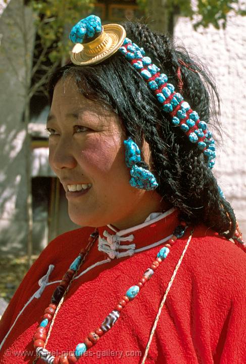 Tibetan woman in traditional dress, Shigatse, Tibet